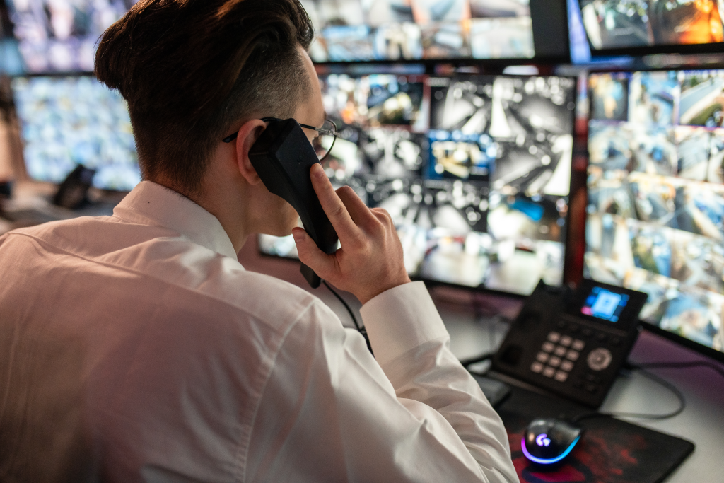 Business owner using video monitoring SMB to protect their store remotely