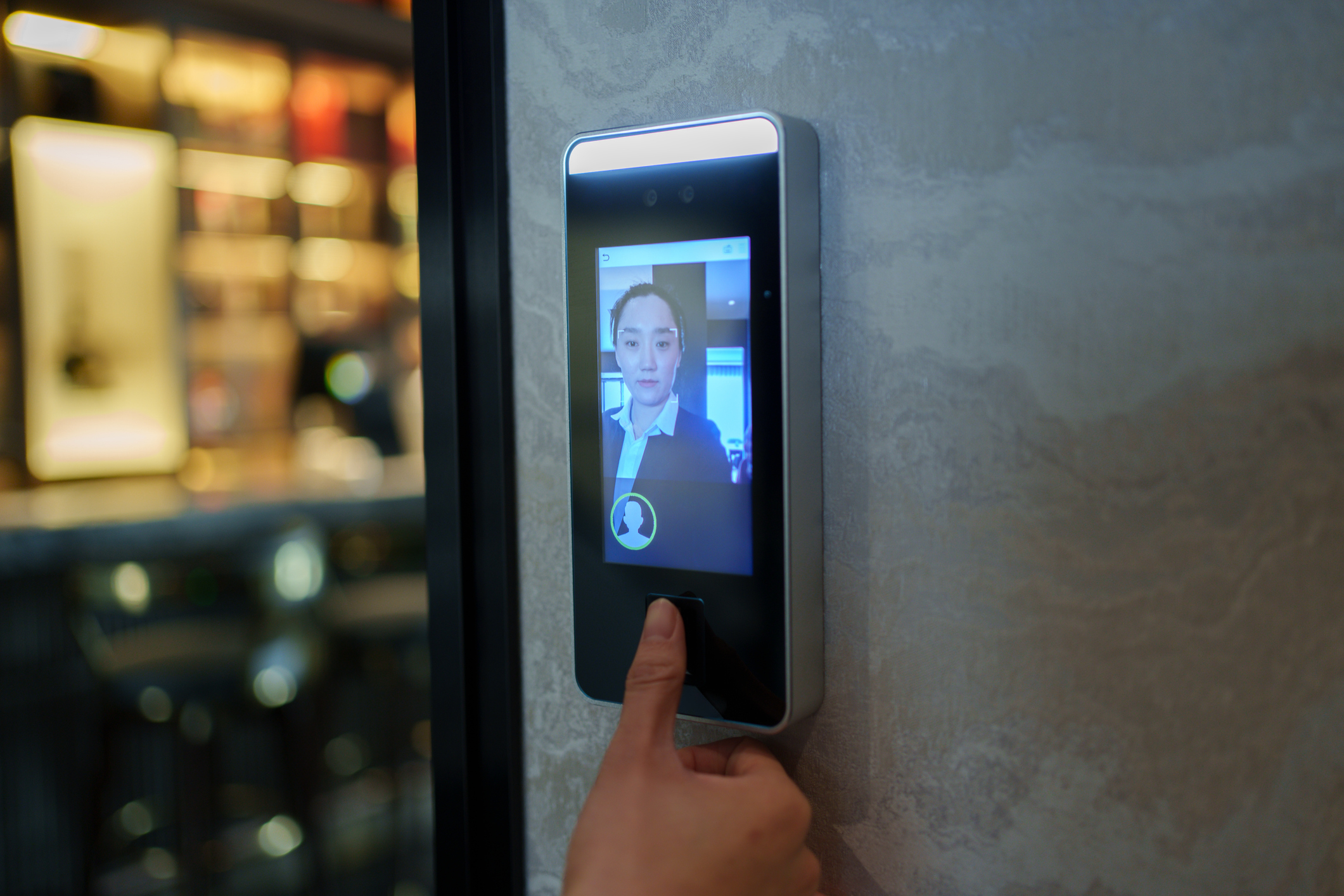 Face recognition and fingerprint recognition system being used to gain entry